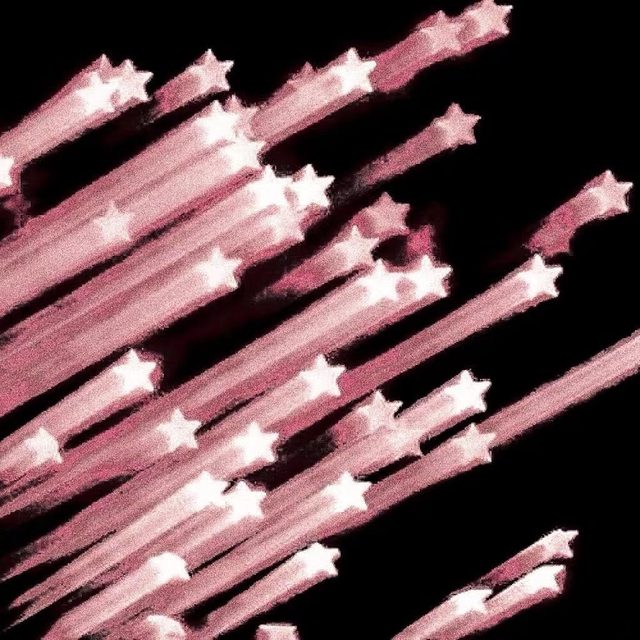 Pink shooting stars streaking across a black sky
